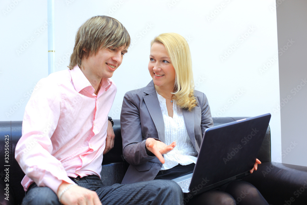 Successful business team working together at office Successful business team working together at office