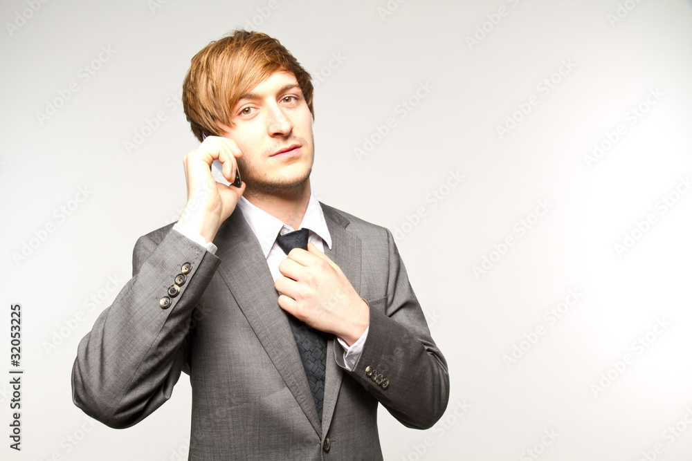 portrait of a manager with mobilephone portrait of a manager with mobilephone