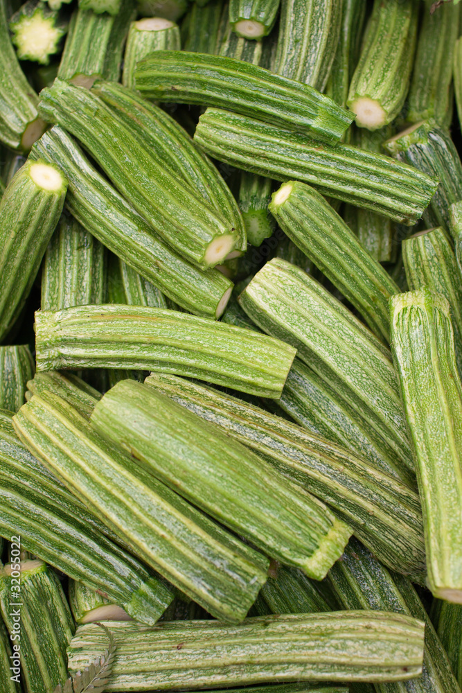 Fresh chopped Roman zucchinis on display at an Italian outdoors Fresh chopped Roman zucchinis on display at an Italian outdoors
