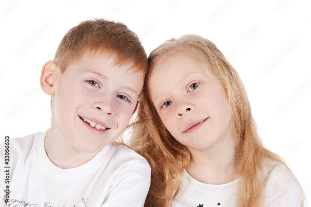 Little brother and sister over white Little brother and sister over white