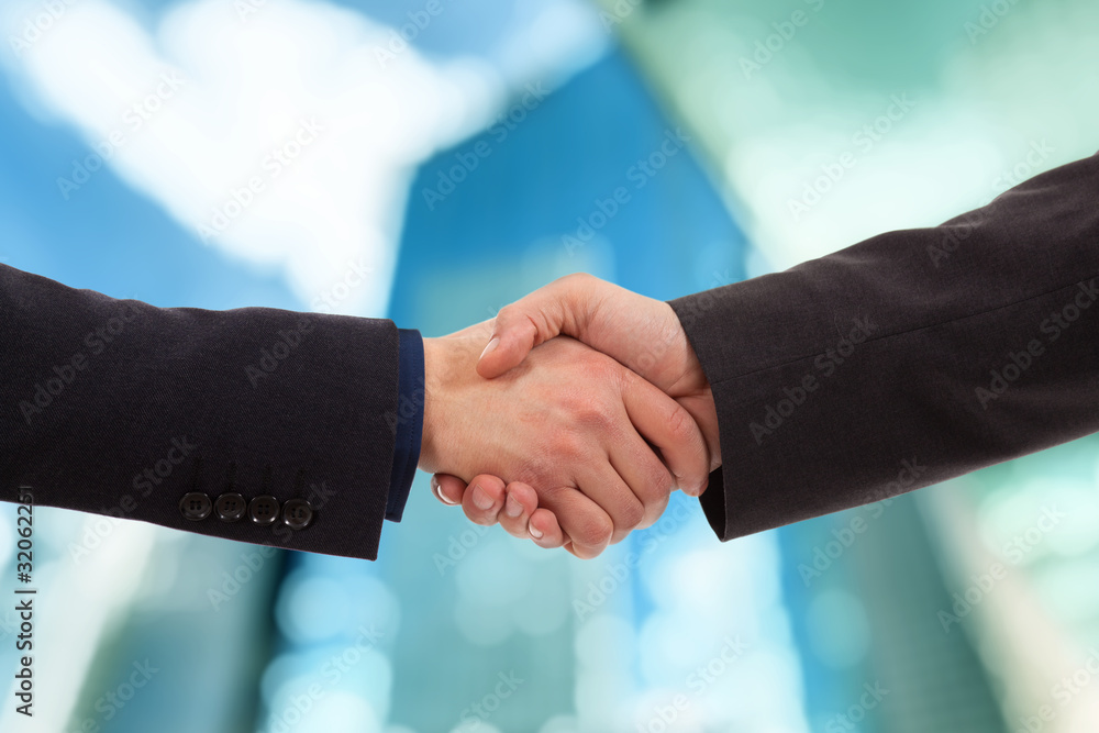 Businesspeople handshake Businesspeople handshake