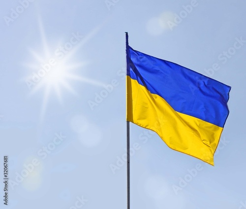 A sun above the flag of Ukraine