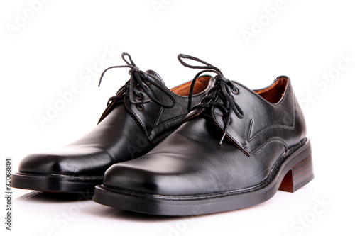 Black shiny man's shoes isolated on white