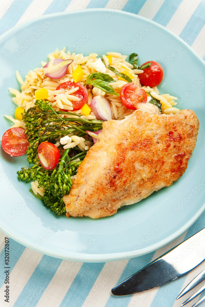 Chicken Breast with pasta salad and broccolini Chicken Breast with pasta salad and broccolini