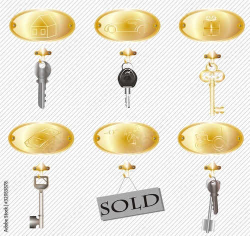  six gold plates with keys with drawings of material well-being. one plate is sold. tangible real estate, money. realtor concept. possibility. success. luck. investmentsts 