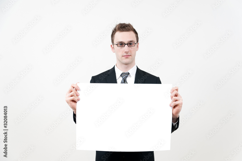 young businessman with blank whiteboard young businessman with blank whiteboard
