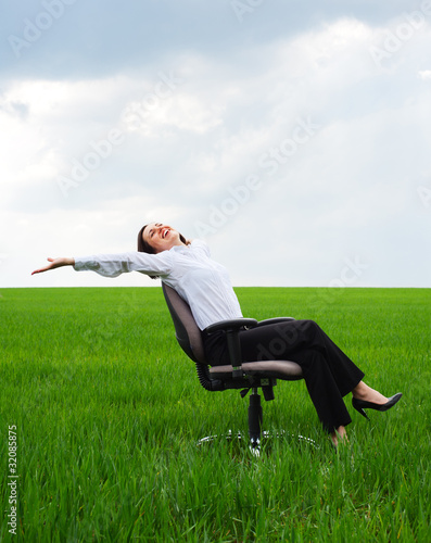 businesswoman resting on chair © ArtFamily