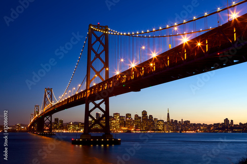 San Francisco skyline and Bay Bridge at sunset  California  USA