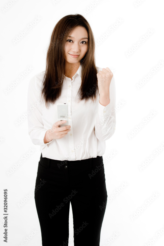 メールでガッツポーズの女性社員 メールでガッツポーズの女性社員