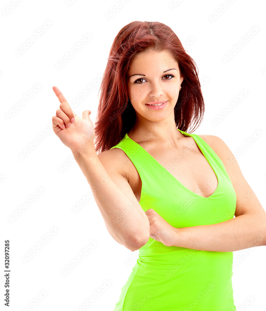 Fototapeta premium Closeup portrait of beautiful young woman pointing her