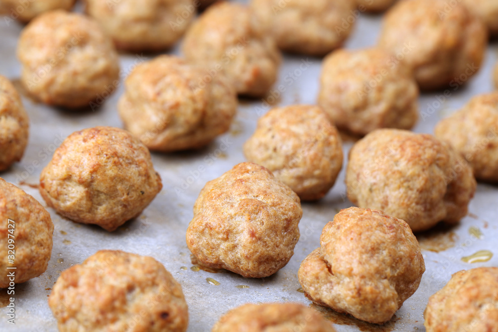 Roast meatballs on baking sheet. Shallow DOF Roast meatballs on baking sheet. Shallow DOF