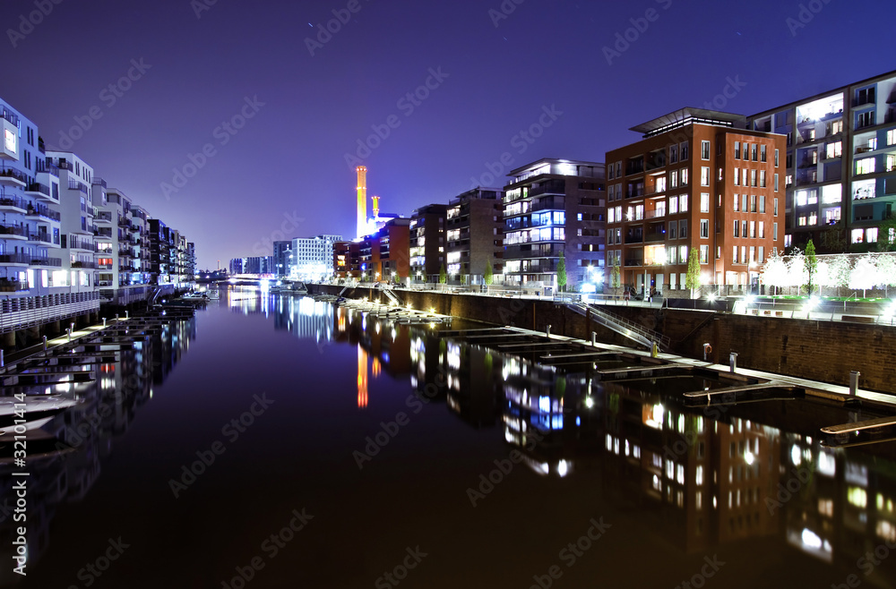 Expensive residential appartments on the river at night