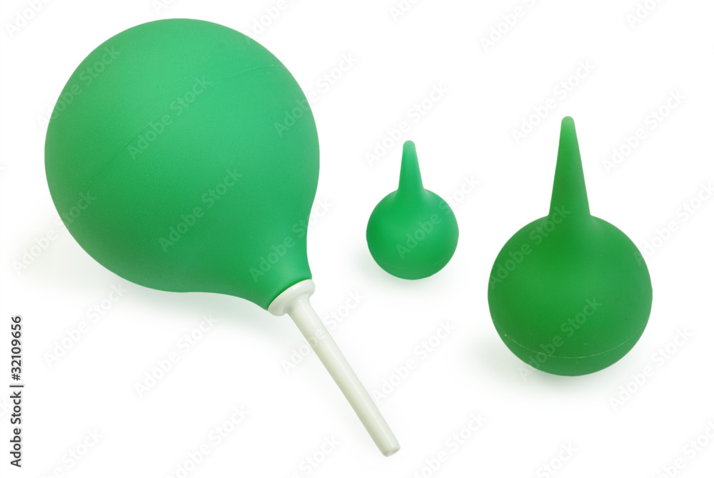 Green pear for syringing on the white background Green pear for syringing on the white background
