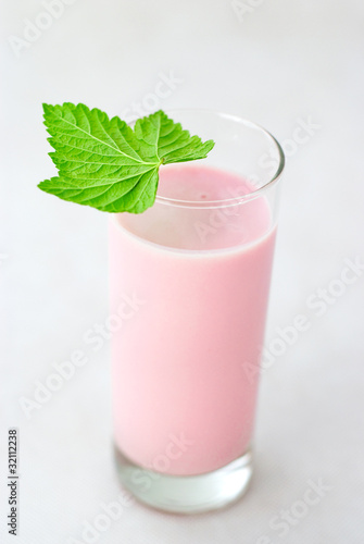 Strawberry dairy cocktail isolated on white background.
