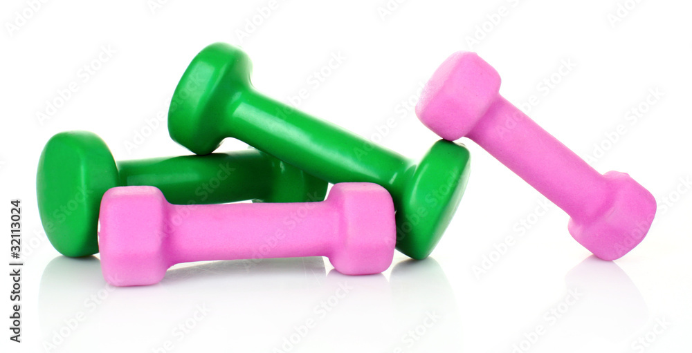 Pink and Green Dumbbells on the white background Pink and Green Dumbbells on the white background