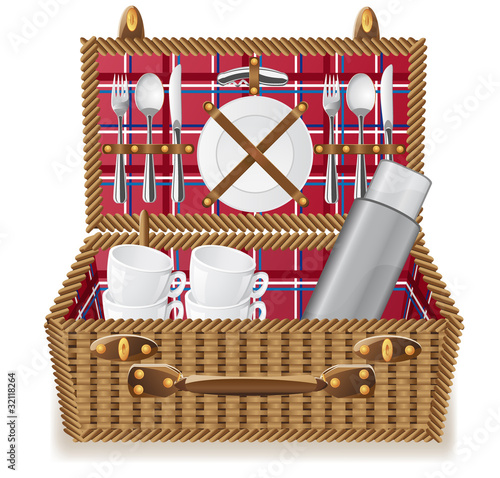 basket for a picnic with tableware