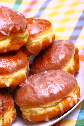 Delicious dessert made of several glazed donuts
