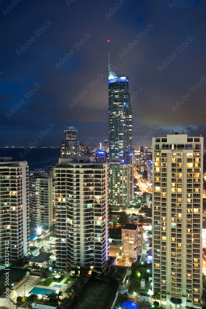 modern city at night at vertical format