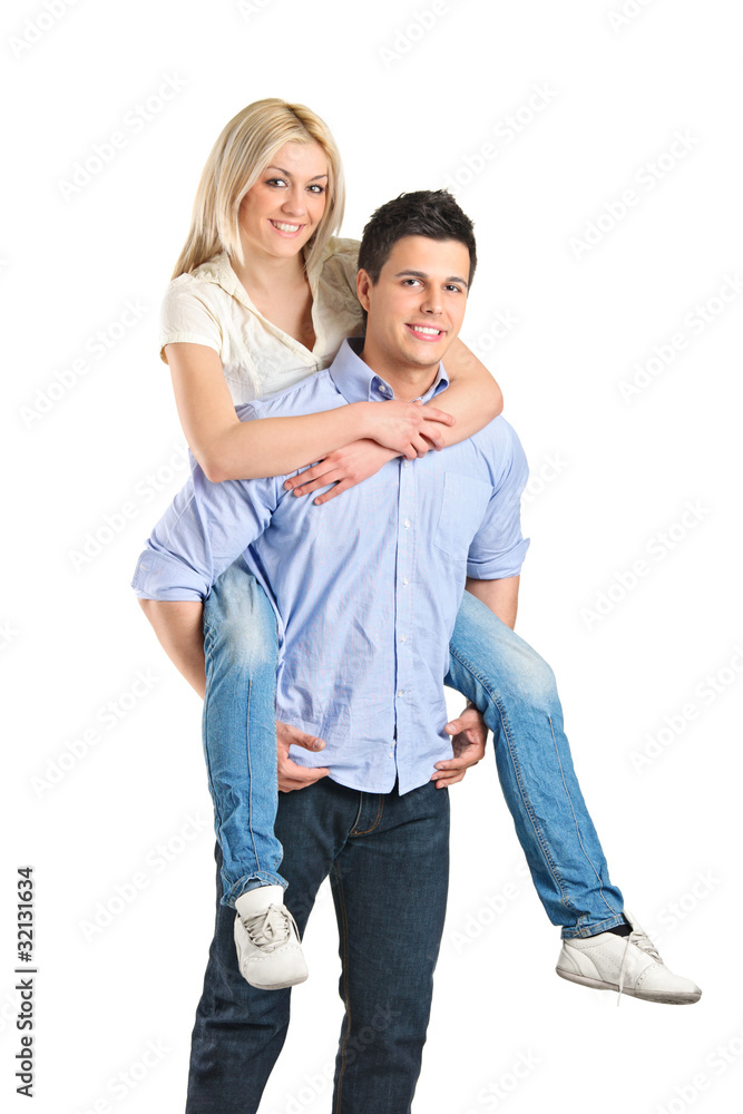 Female enjoying a piggyback ride on boyfriends back Female enjoying a piggyback ride on boyfriends back