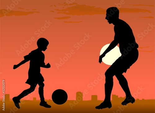 soccer players against sity sunset © AZimage