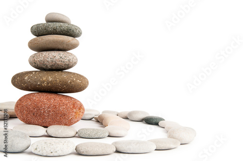 Stack of pebbles isolated on the white