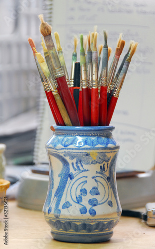 Pot with paintbrushes