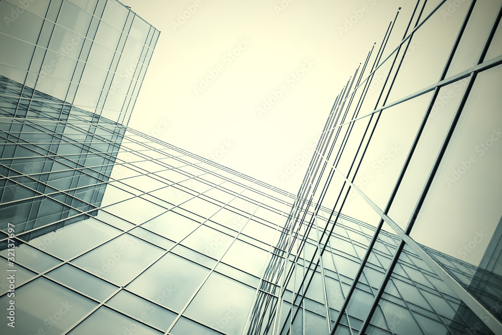 Obraz premium white texture of glass transparent skyscrapers at night