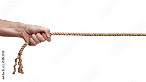 Fotografie man pulling rope