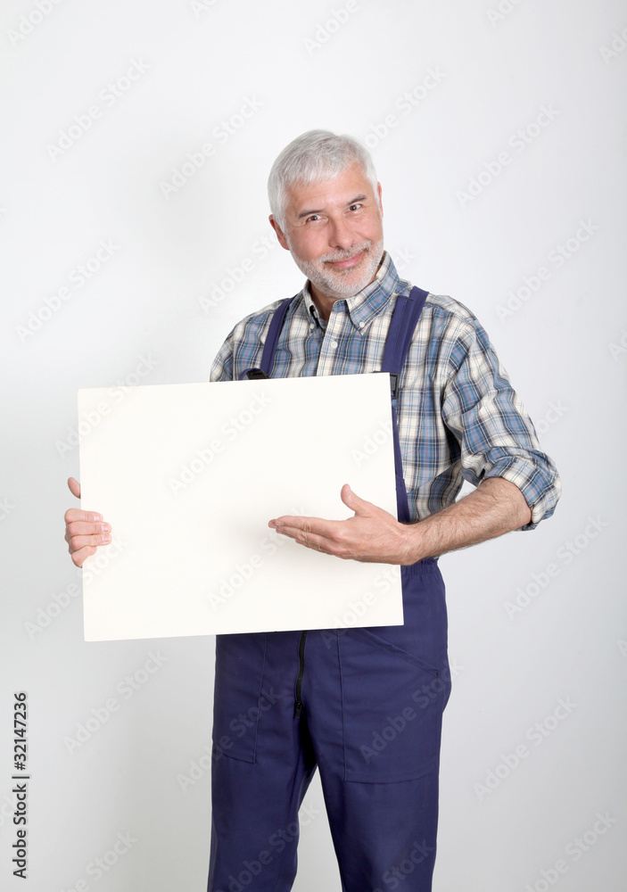 Portrait of artisan showing white board Portrait of artisan showing white board