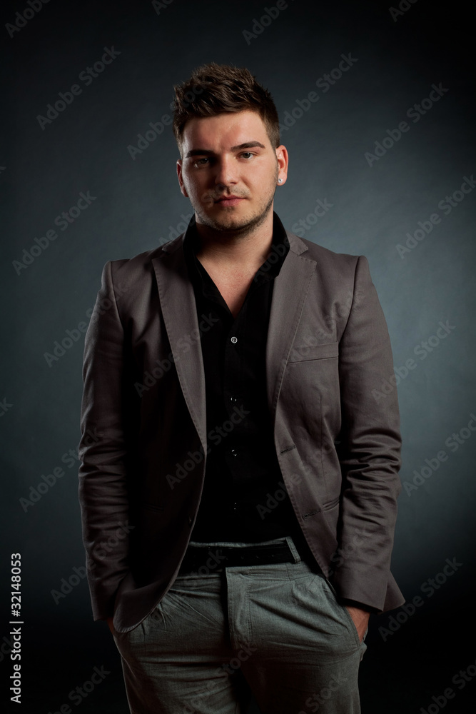 attractive young man wearing elegant suit