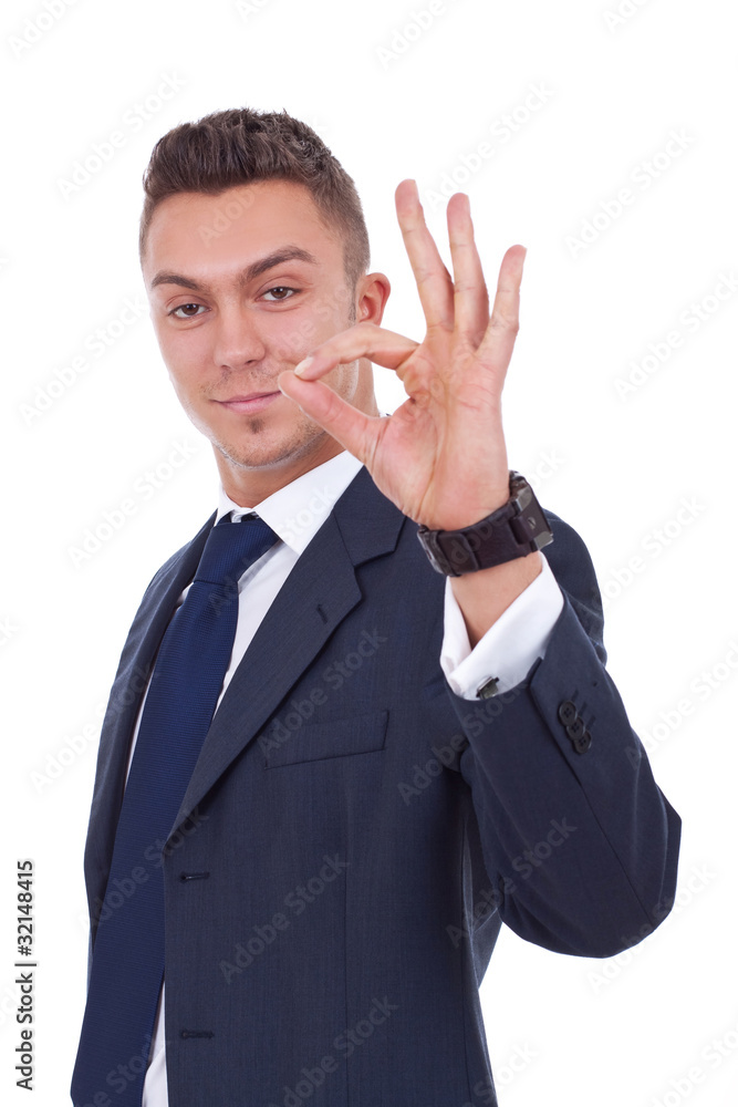 Young business man, showing a sign ok