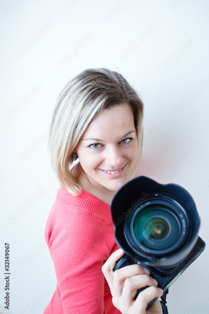 pretty female photographer with her digital camera pretty female photographer with her digital camera