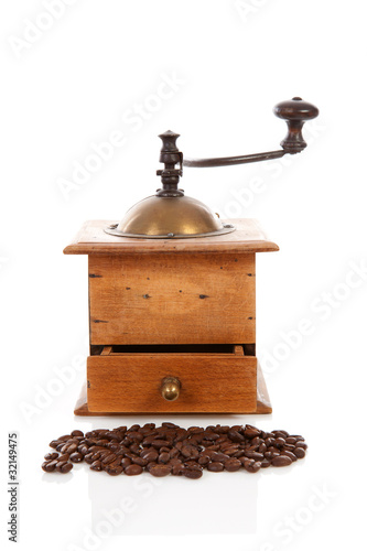 Old wooden coffee grinderover white background