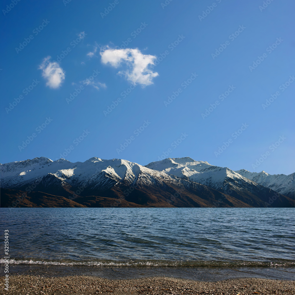 A Beautiful Lake with Blue Sky and Mountains