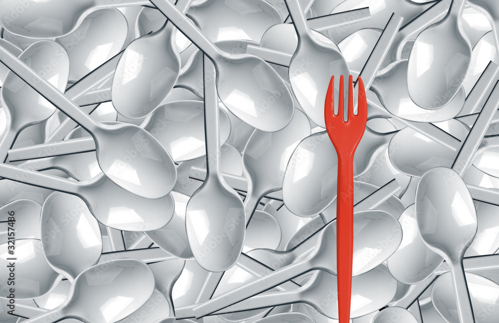 Fototapeta Plastic spoons and red fork