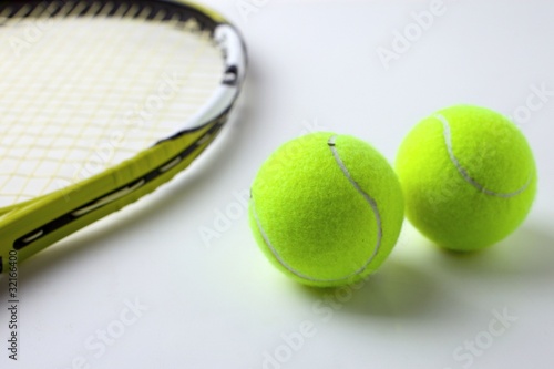 Tennis racket and balls © Dejan Stanisavljevic