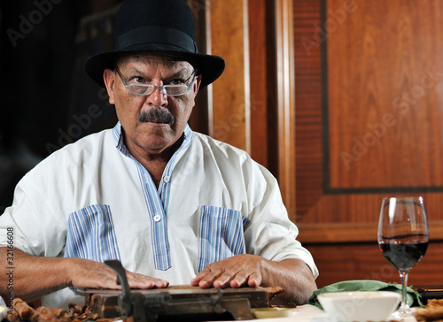 Photography man making luxury handmade cuban cigare