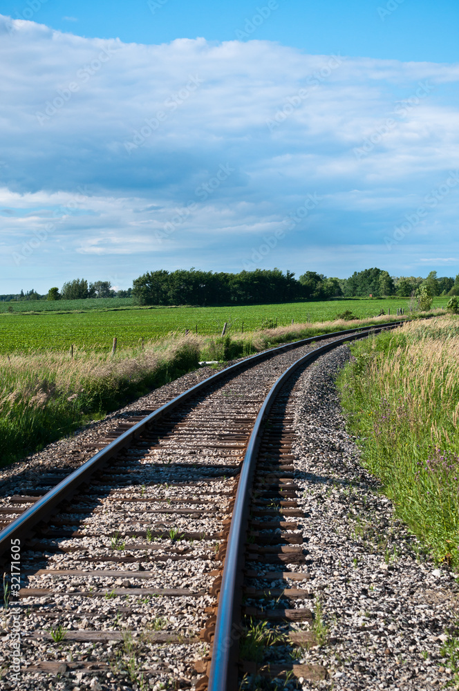 Railroad Tracks Curving Off into the Distance