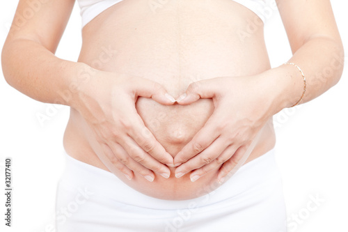 Wallpaper Mural Pregnant woman hold hands on a belly like heart Torontodigital.ca