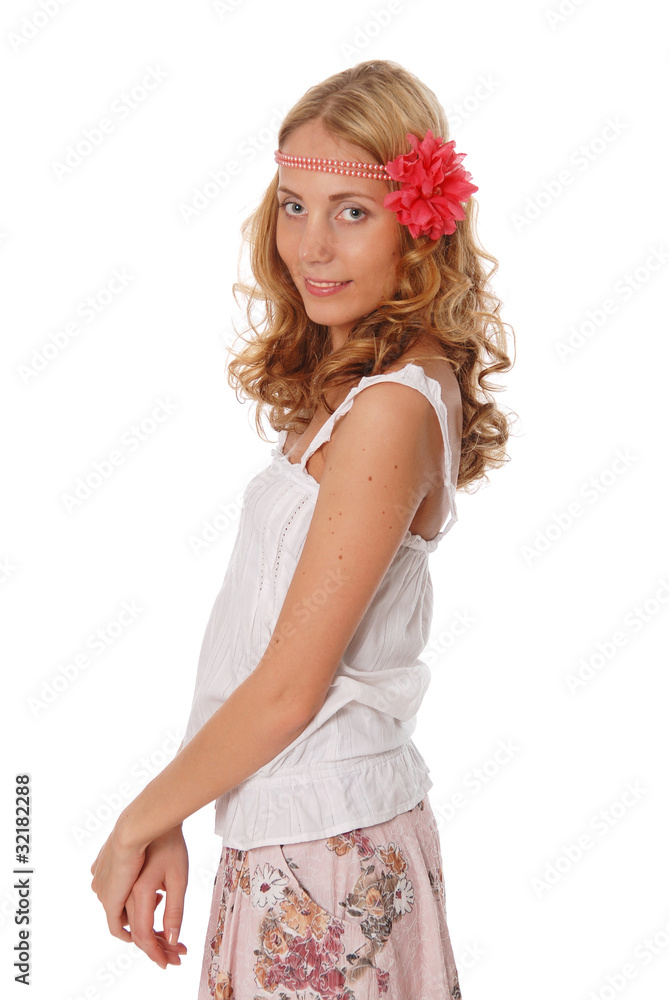 The young girl in a summer dress with a flower on a head isolate The young girl in a summer dress with a flower on a head isolate
