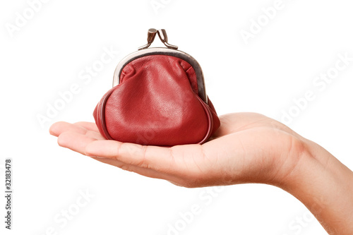 Hand holding retro styled money pouch, isolated on white