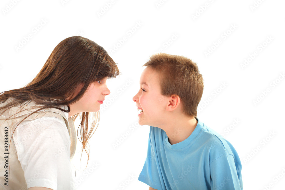 happy brother and sister looking to each other happy brother and sister looking to each other