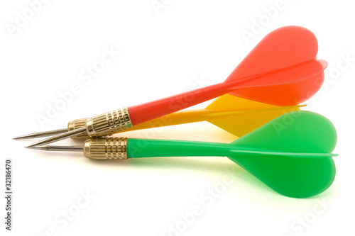Set of colorful darts isolated on white background. © graja