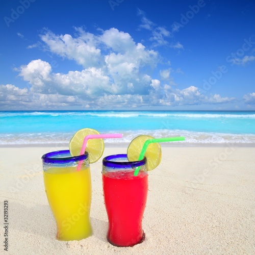 beach cocktails yellow red in caribbean tropical sea