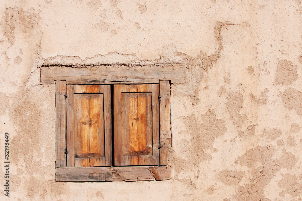 Fototapeta premium Beautiful old window in hisorical adobe, Taos, NM