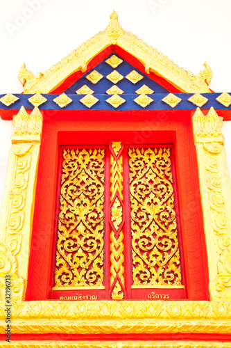 Golden Wood Carving ,Traditional Thai Style at the window of chu