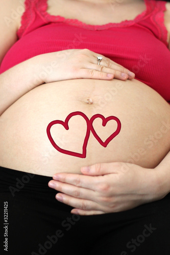 Wallpaper Mural Pregnant girl hugs her future love hearts Torontodigital.ca