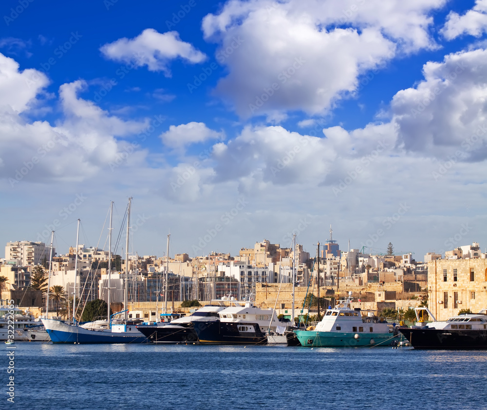 Yachts   against Manoel island