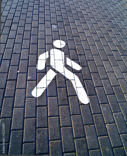 pedestrian zone marked by white man sign photo