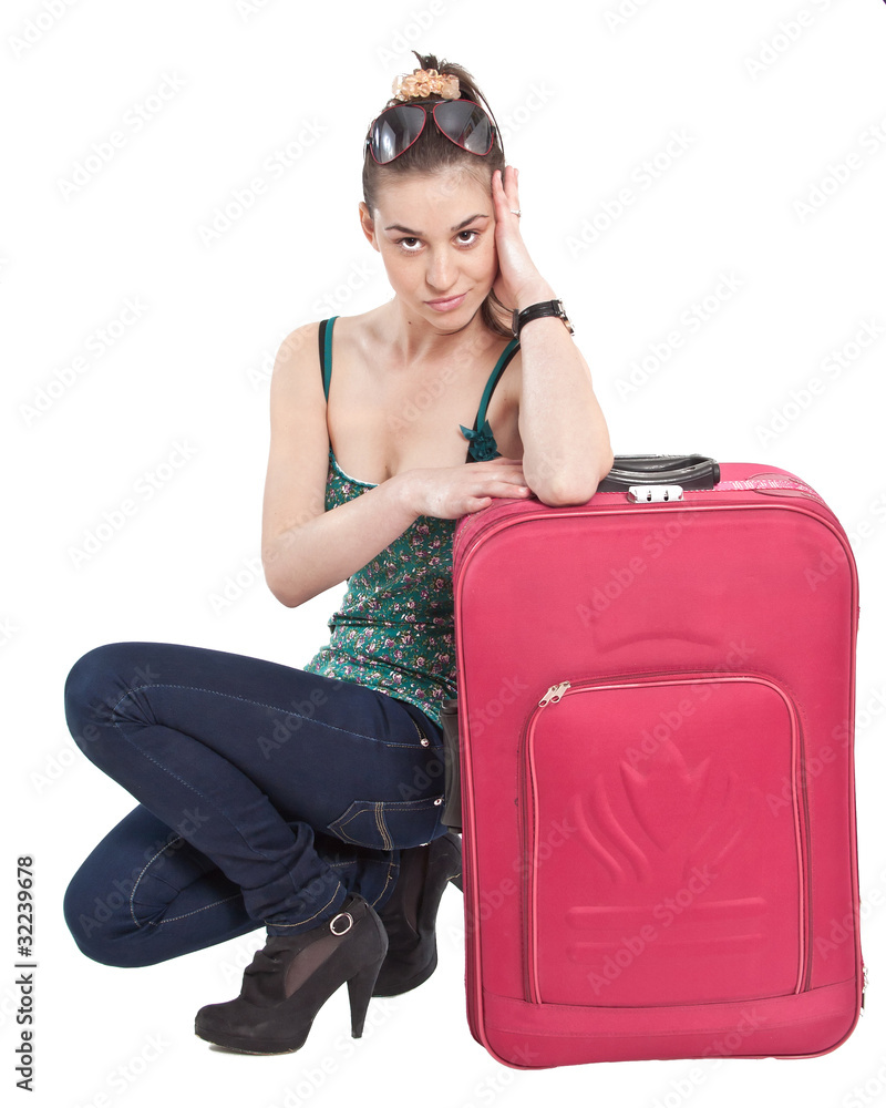Young woman, resting on her bags Young woman, resting on her bags